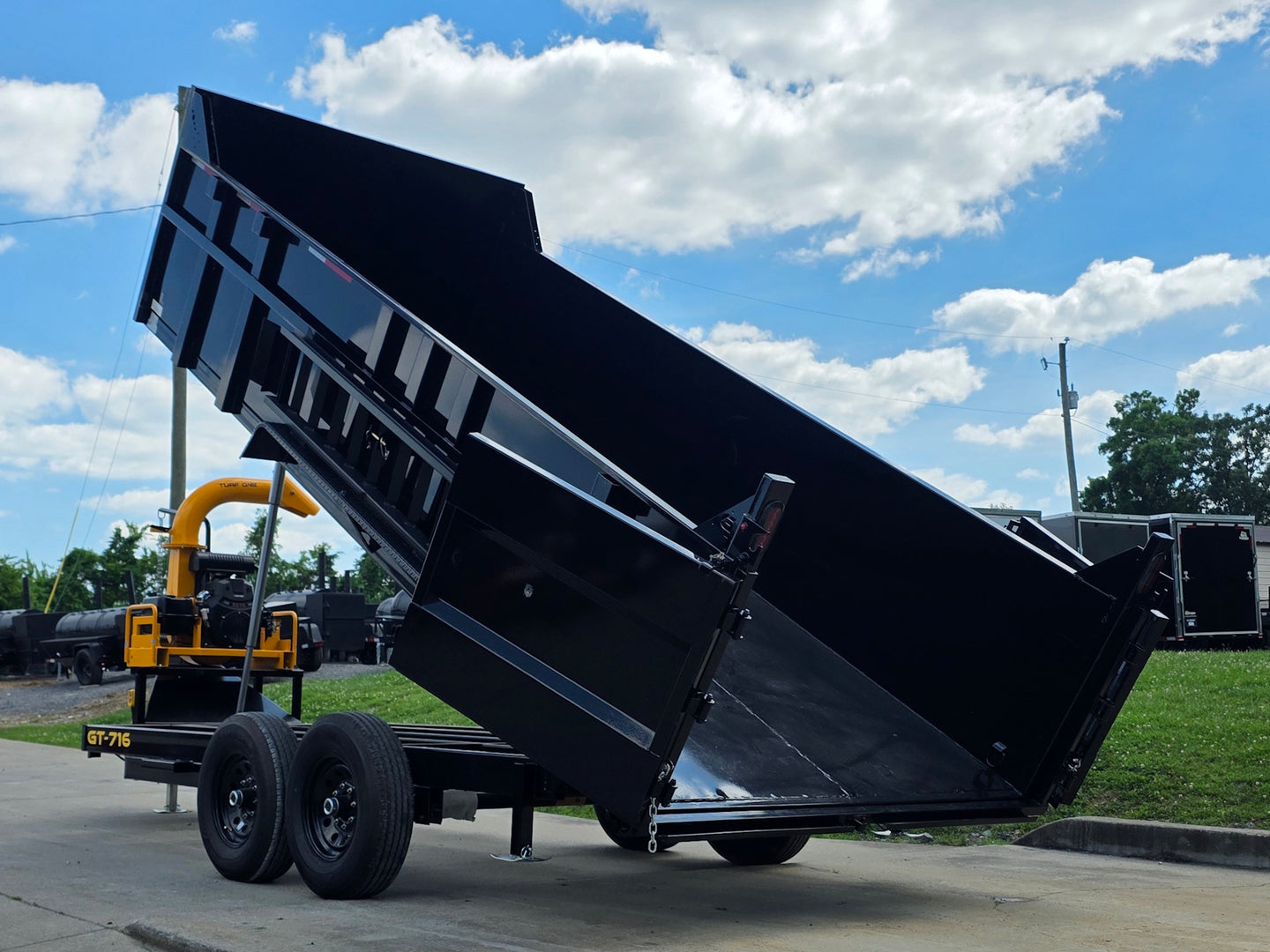 7x16 Telescopic Dump Trailer with 3ft Sides Powder Coated (2) 7K Axles GVWR 14k Lifted back left angle view 