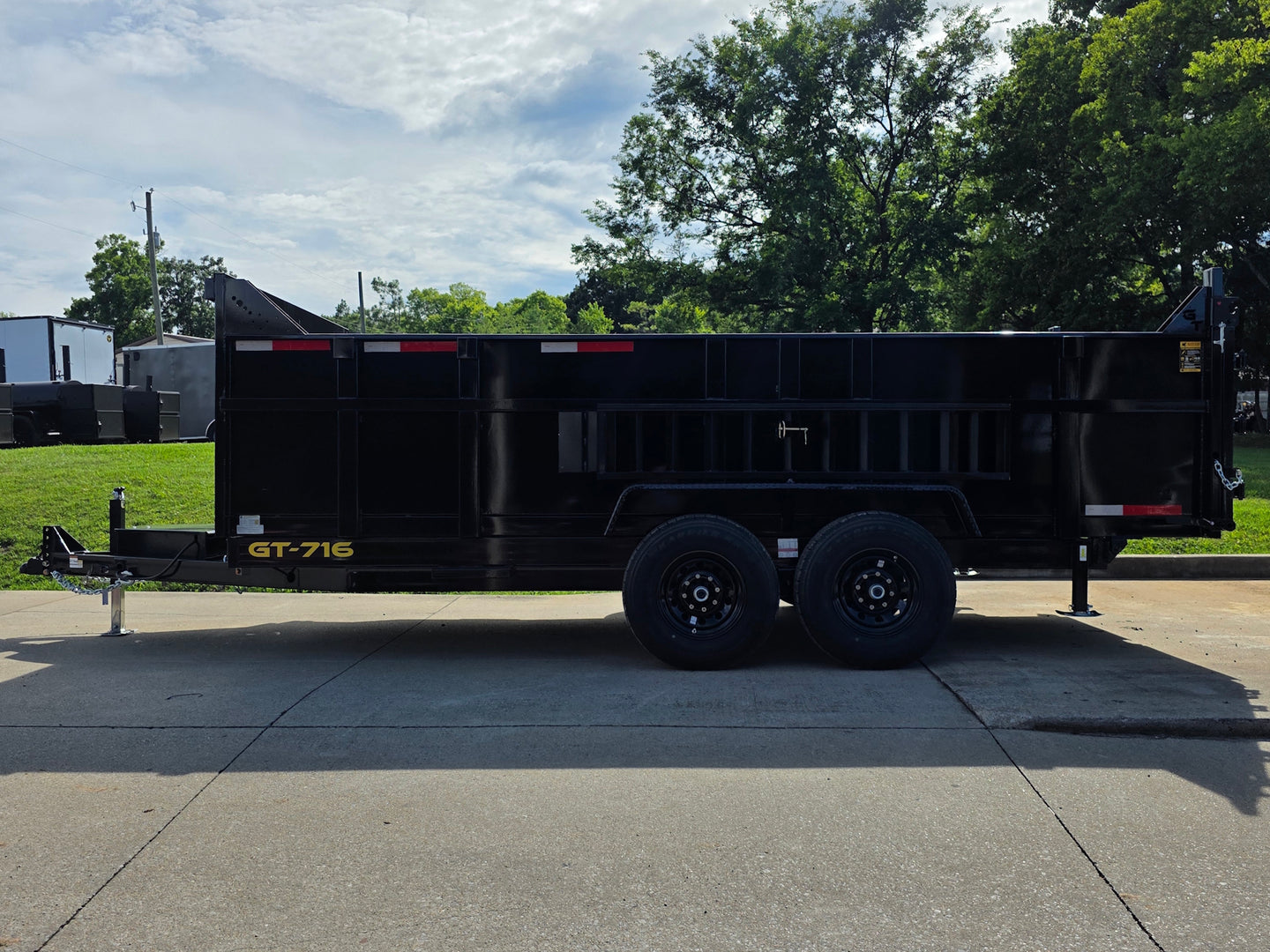 7x16 Telescopic Dump Trailer with 3ft Sides Powder Coated (2) 7K Axles GVWR 14k Right side.