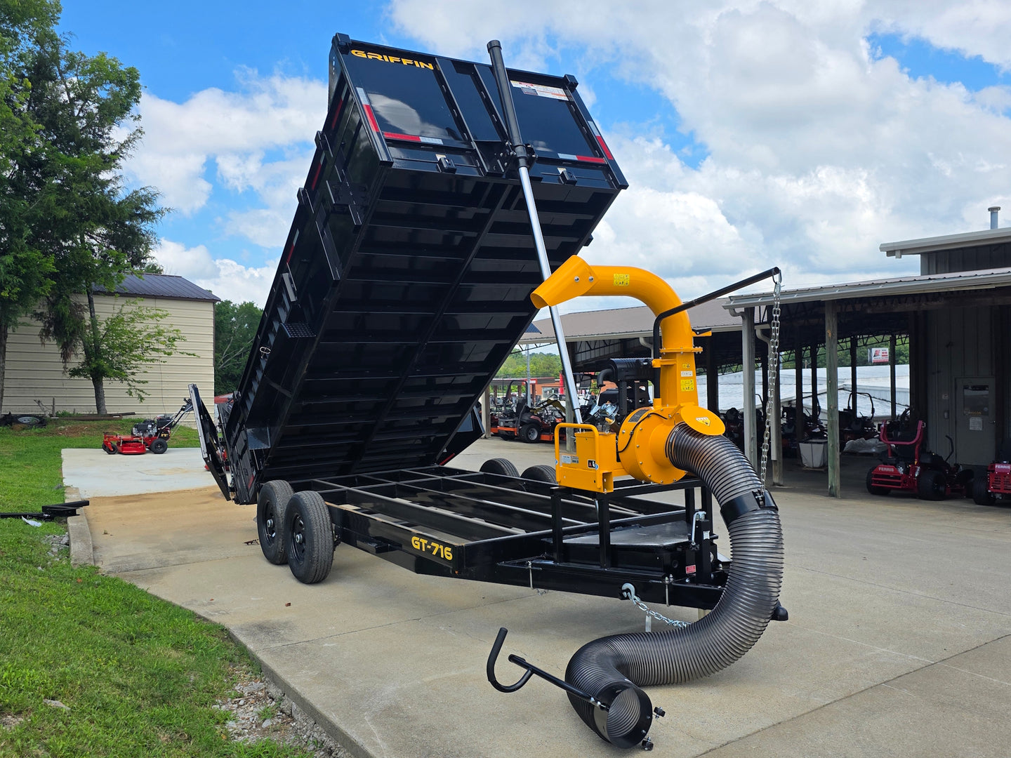 7x16x3 Gorilla Telescopic Leaf Dump Trailer System With 21hp Leaf Debris Loader Lifted front left angle picture