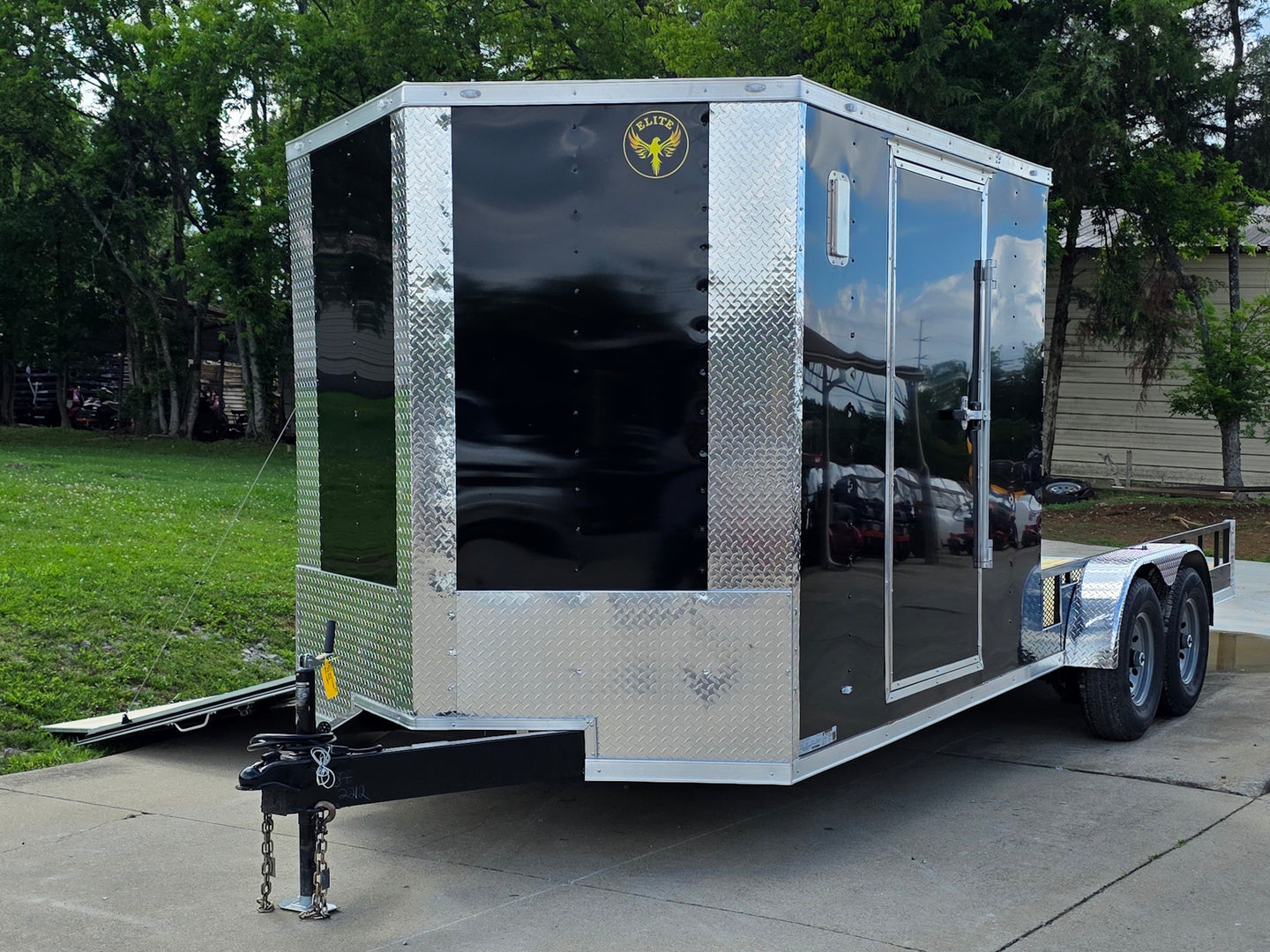 7x20 Black V-nose Hybrid Enclosed Trailer (2) 7K Axles Front right angle picture 