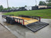 7x20 Dovetail Utility Trailer with 1ft Mesh Side Gate (2) 3,500lb Axles 7K GVWR Open back left angle picture 