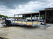 7x20 Utility Trailer Dovetail Powder Coated W/gate (2) 3500lb Axles 7k GVWR  2-brakes Open front left angle picture 