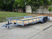 7x20 Utility Trailer Dovetail Powder Coated W/gate (2) 3500lb Axles 7k GVWR  2-brakes Open front right angle picture 