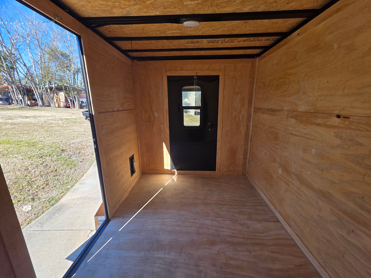 7x26 Black Hybrid Enclosed and Utility Trailer (2) 5200lb Axles 10K GVWR inside door deck view picture 