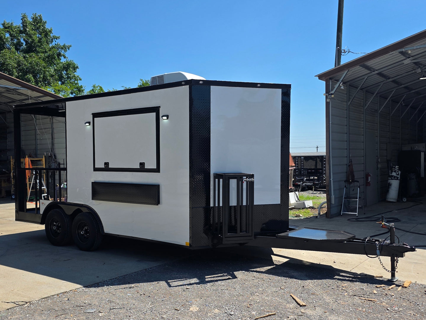 8.5’ X 16’ White Mobile kitchen food event concession trailer w/ 6’ Porch Front left angle picture 