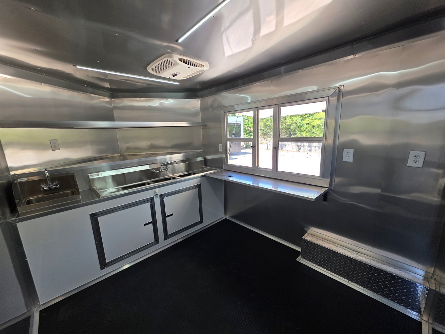 8.5’ X 16’ White Mobile kitchen food event concession trailer w/ 6’ Porch Interior back right angle picture 