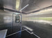 8.5’ X 16’ White Mobile kitchen food event concession trailer w/ 6’ Porch Interior front left angle picture 