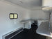 8.5' X 20' Charcoal Grey Custom Enclosed Trailer Mobile Office and Command Center Interior back right angle picture 