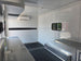 8.5' X 20' Charcoal Grey Custom Enclosed Trailer Mobile Office and Command Center Interior front left angle picture 