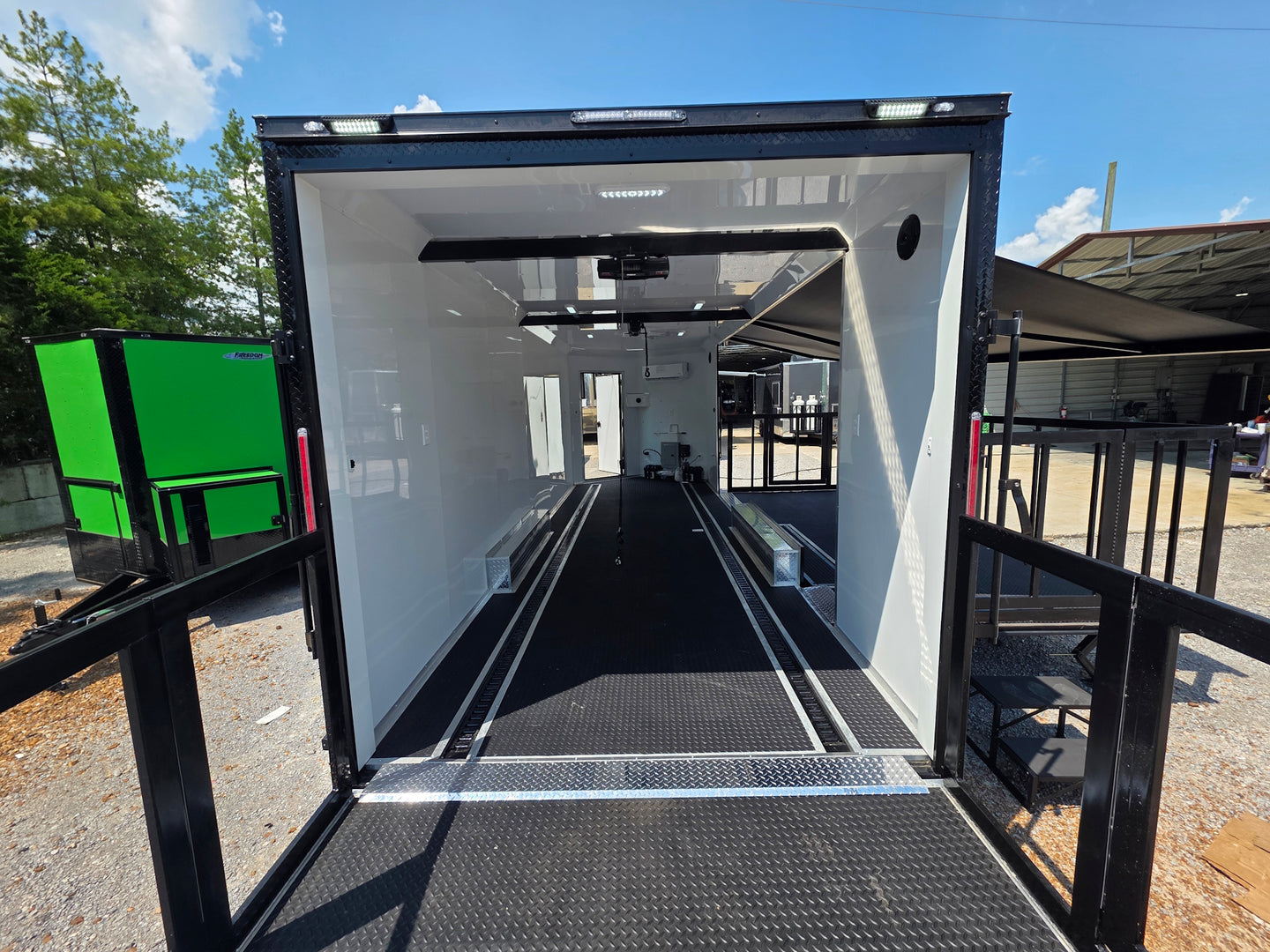 8.5' X 24' Black Custom Enclosed Trailer For Marketing and Showcase Events Back porch back side picture 