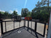 8.5' X 24' Black Custom Enclosed Trailer For Marketing and Showcase Events back porch front left angle picture 