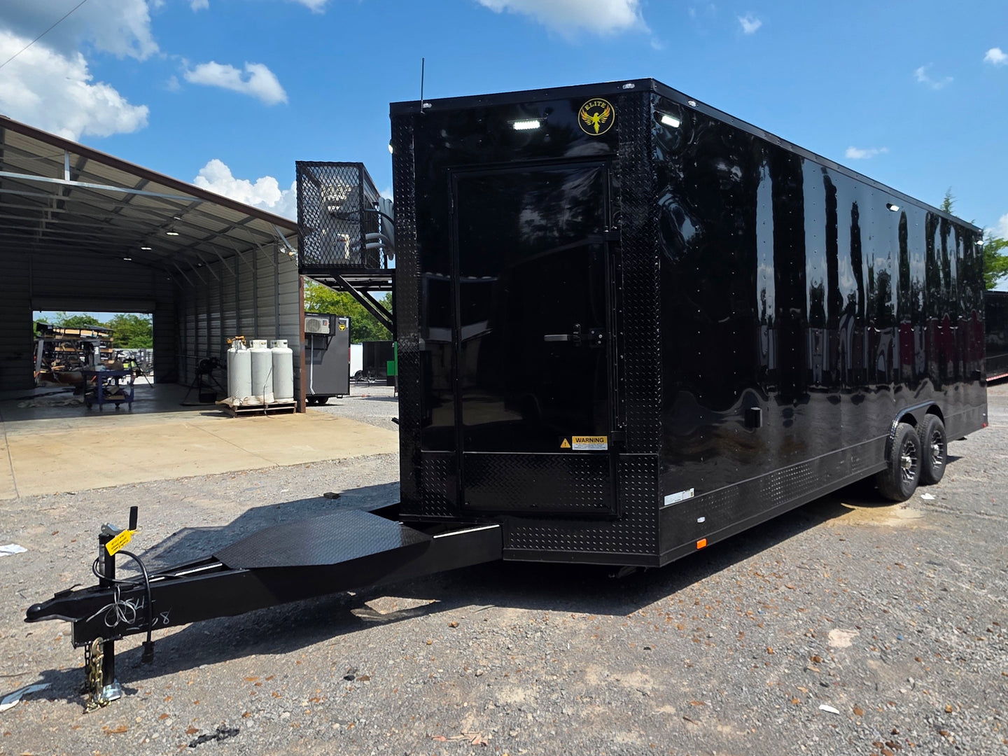 8.5' X 24' Black Custom Enclosed Trailer For Marketing and Showcase Events Front right angle picture 