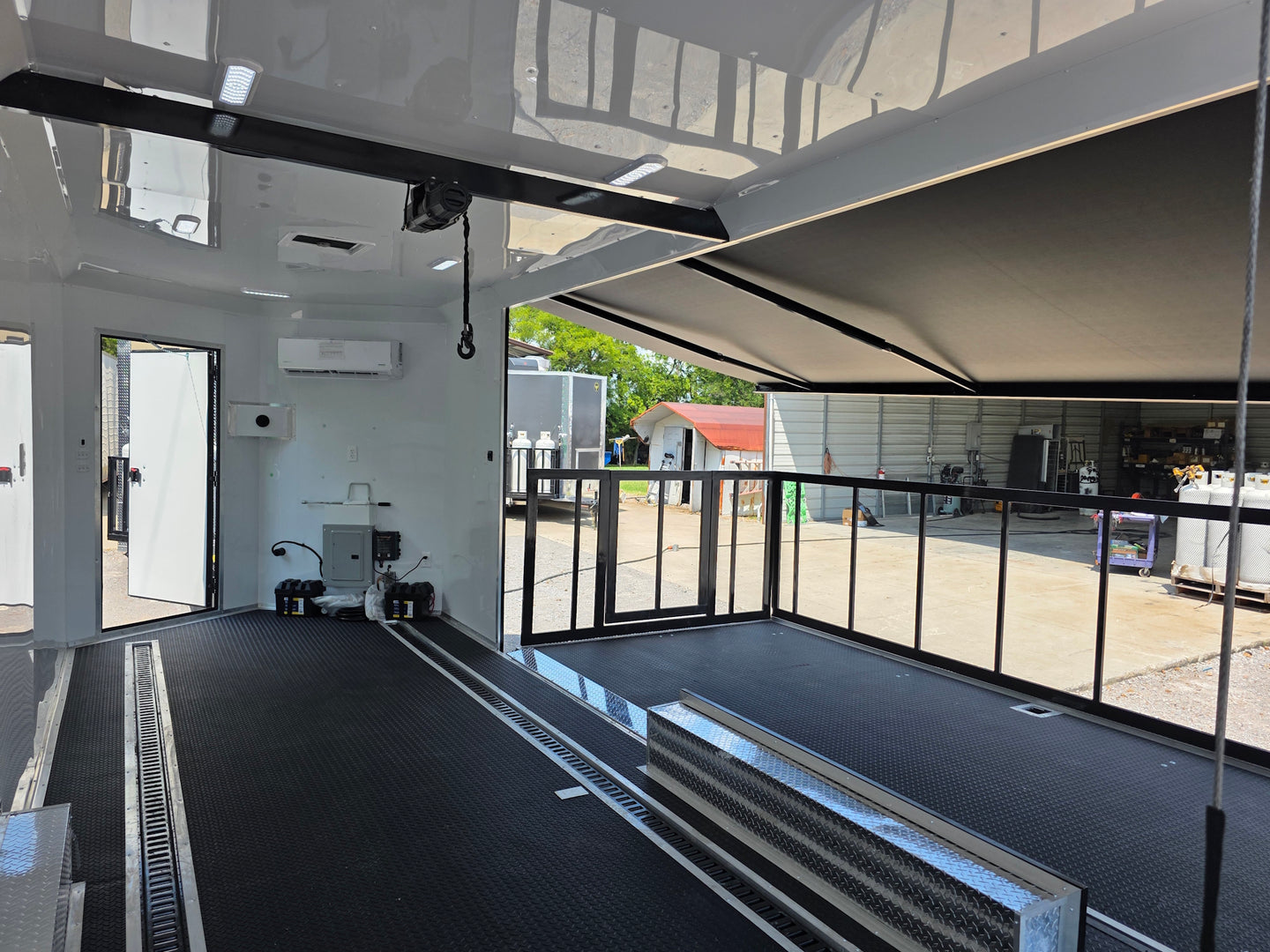 8.5' X 24' Black Custom Enclosed Trailer For Marketing and Showcase Events Interior back left angle picture 