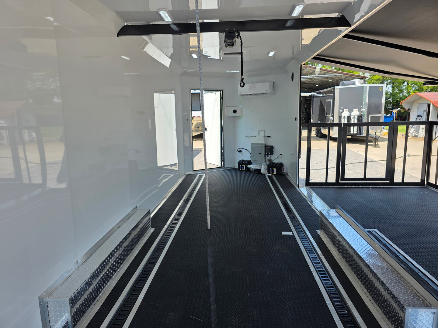 8.5' X 24' Black Custom Enclosed Trailer For Marketing and Showcase Events Interior back side picture 