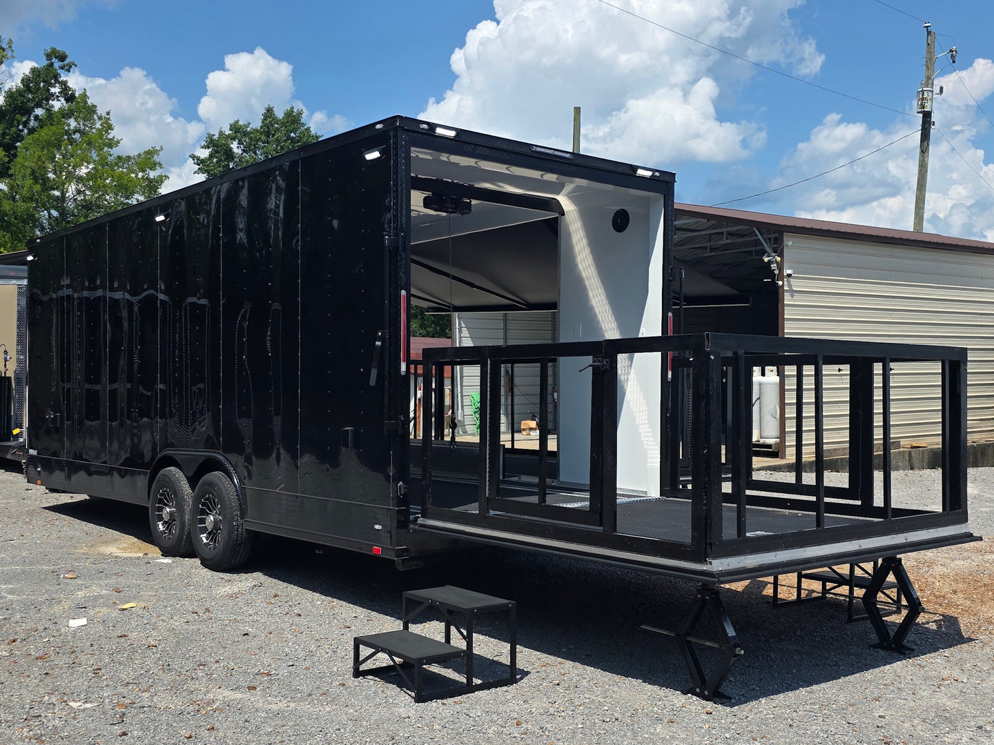 8.5' X 24' Black Custom Enclosed Trailer For Marketing and Showcase Events Open back left angle picture 