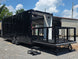 8.5' X 24' Black Custom Enclosed Trailer For Marketing and Showcase Events Open back left angle picture 