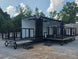 8.5' X 24' Black Custom Enclosed Trailer For Marketing and Showcase Events Open back right angle picture