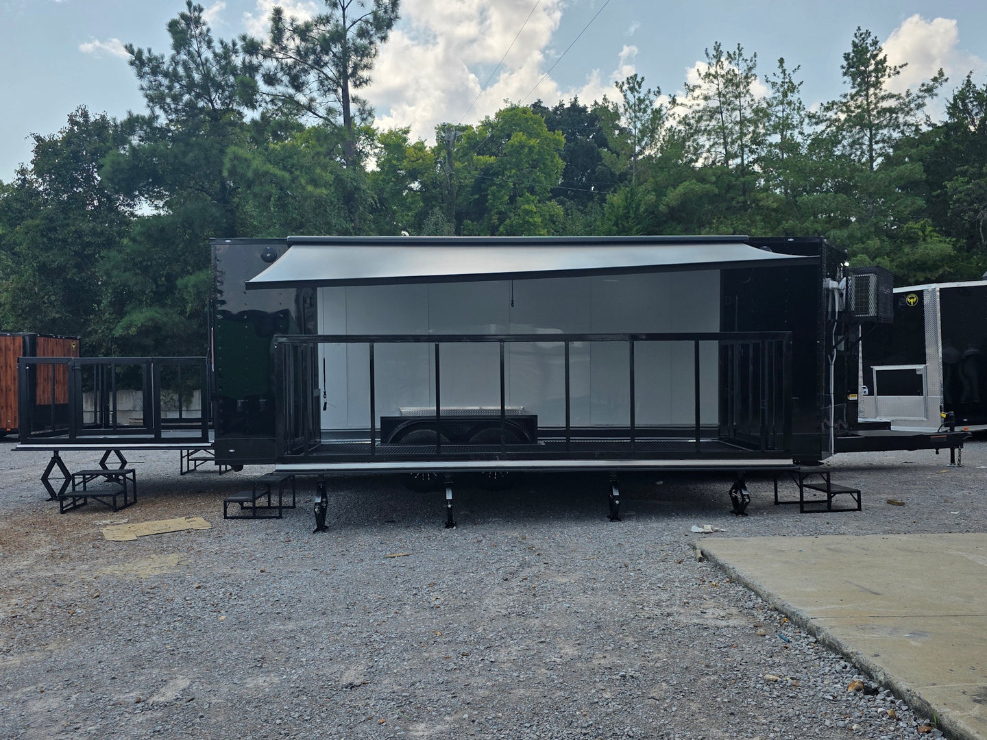 8.5' X 24' Black Custom Enclosed Trailer For Marketing and Showcase Events Open left side picture 