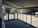 8.5' X 24' Black Custom Enclosed Trailer For Marketing and Showcase Events Side porch back left angle picture 
