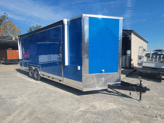 8.5' X 24' Cobalt Blue Stage & Event Marketing Concession Trailer Drivers Side Front Angle Trailer Closed