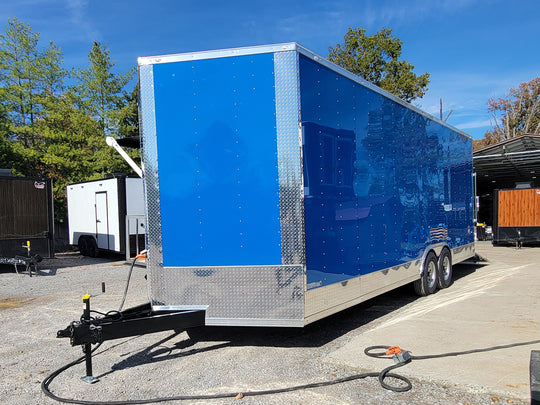 8.5' X 24' Cobalt Blue Stage & Event Marketing Concession Trailer Drivers Side View with stage out