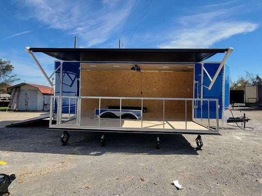 8.5' X 24' Cobalt Blue Stage & Event Marketing Concession Trailer Passenger Side Stage Down View