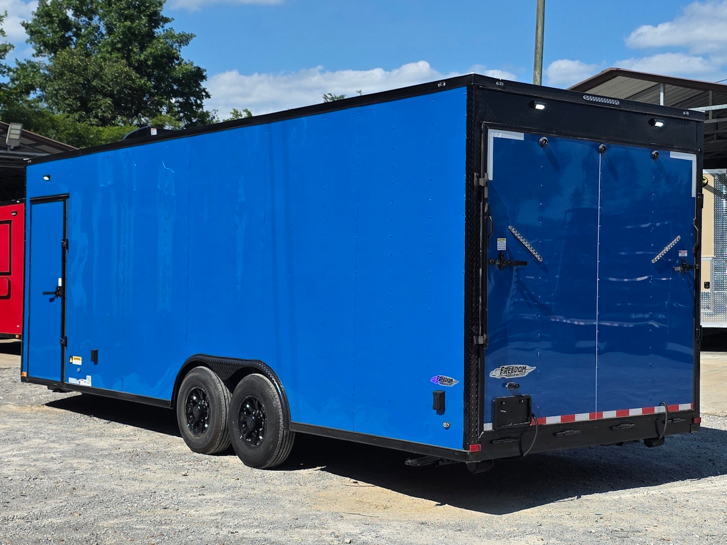 8.5' X 24' Concession Trailer Cobalt Blue With Black Out Trim Stage and Event Marketing Back left angle picture 