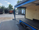 8.5' X 24' Concession Trailer Cobalt Blue With Black Out Trim Stage and Event Marketing Front left angel stage picture 