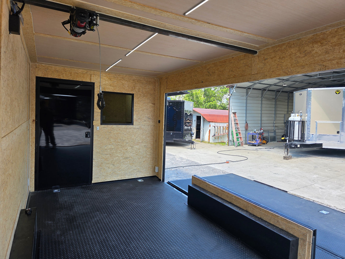 8.5' X 24' Concession Trailer Cobalt Blue With Black Out Trim Stage and Event Marketing Interior back left angle picture 
