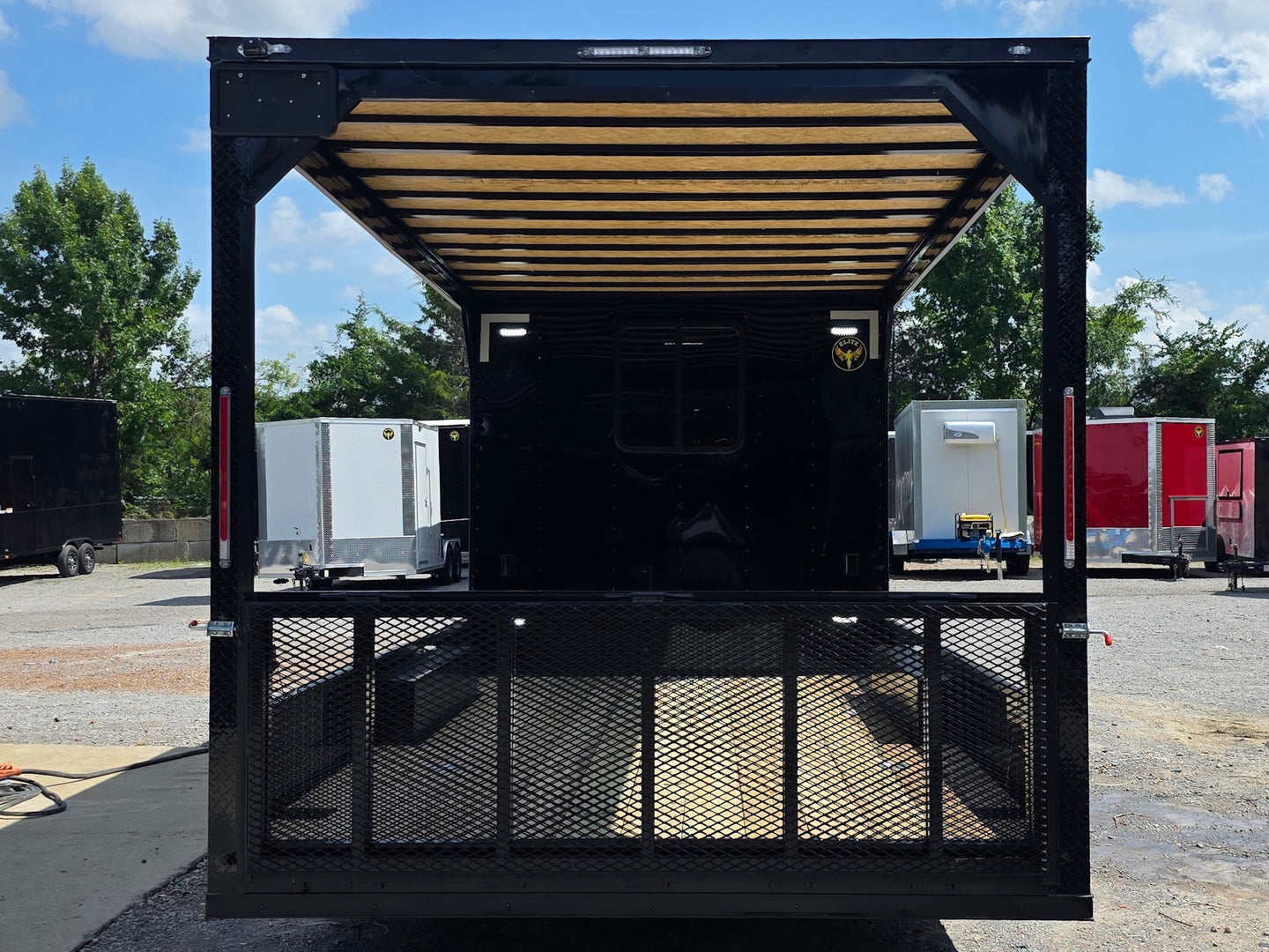8.5' X 24' Custom Black Hybrid Enclosed Trailer (2) 5,200 lb Axles Back side picture 