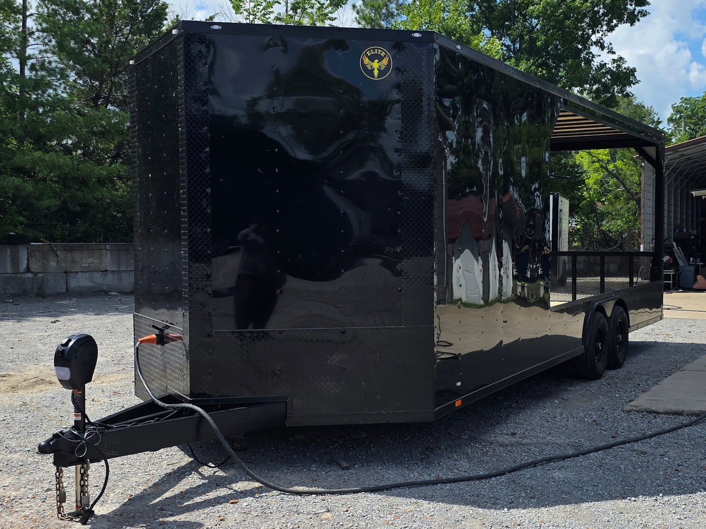8.5' X 24' Custom Black Hybrid Enclosed Trailer (2) 5,200 lb Axles Front right angle picture 