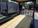 8.5' X 24' Custom Black Hybrid Enclosed Trailer (2) 5,200 lb Axles Porch front right angle picture 
