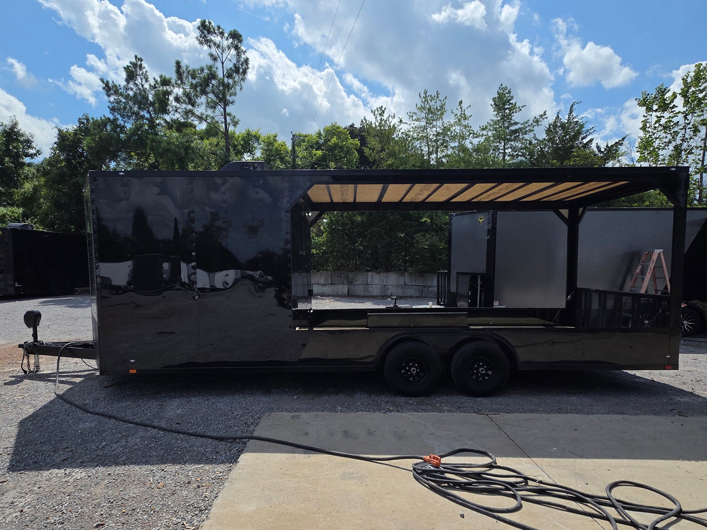8.5' X 24' Custom Black Hybrid Enclosed Trailer (2) 5,200 lb Axles Right side picture 