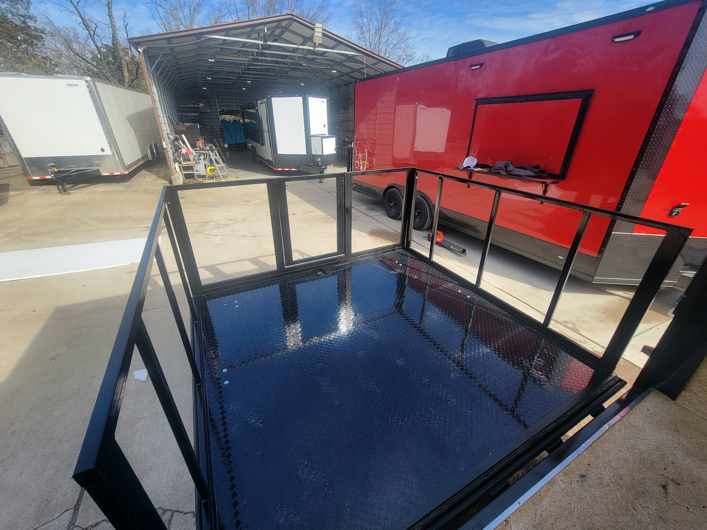 8.5' X 24' Custom Enclosed Stage Trailer Mobile Cigar LoungeRear Stage View