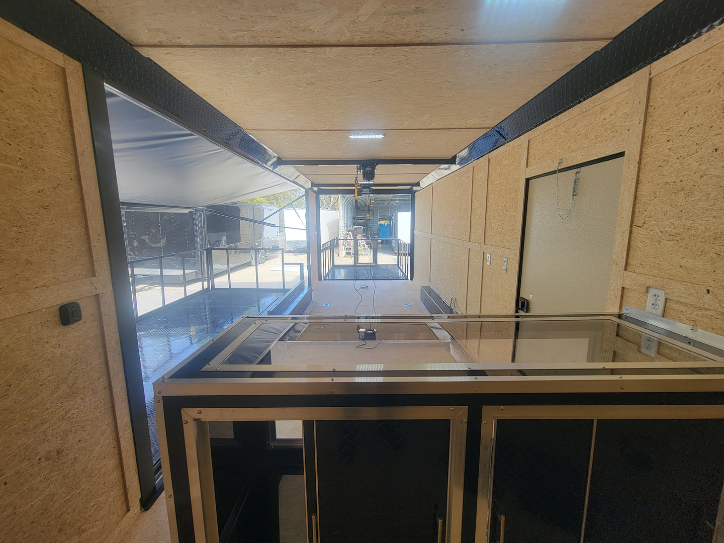 8.5' X 24' Custom Enclosed Stage Trailer Mobile Cigar Lounge Interior Picture 3