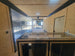 8.5' X 24' Custom Enclosed Stage Trailer Mobile Cigar Lounge Interior Picture 3