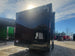 8.5' X 24' Custom Enclosed Stage Trailer Mobile Cigar Lounge Passenger Side Rear Corner Shot