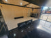 8.5' X 24' Custom Enclosed Stage Trailer Mobile Cigar Lounge Stage and Under Awning Looking In 