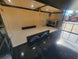8.5' X 24' Custom Enclosed Stage Trailer Mobile Cigar Lounge Stage and Under Awning Looking In 
