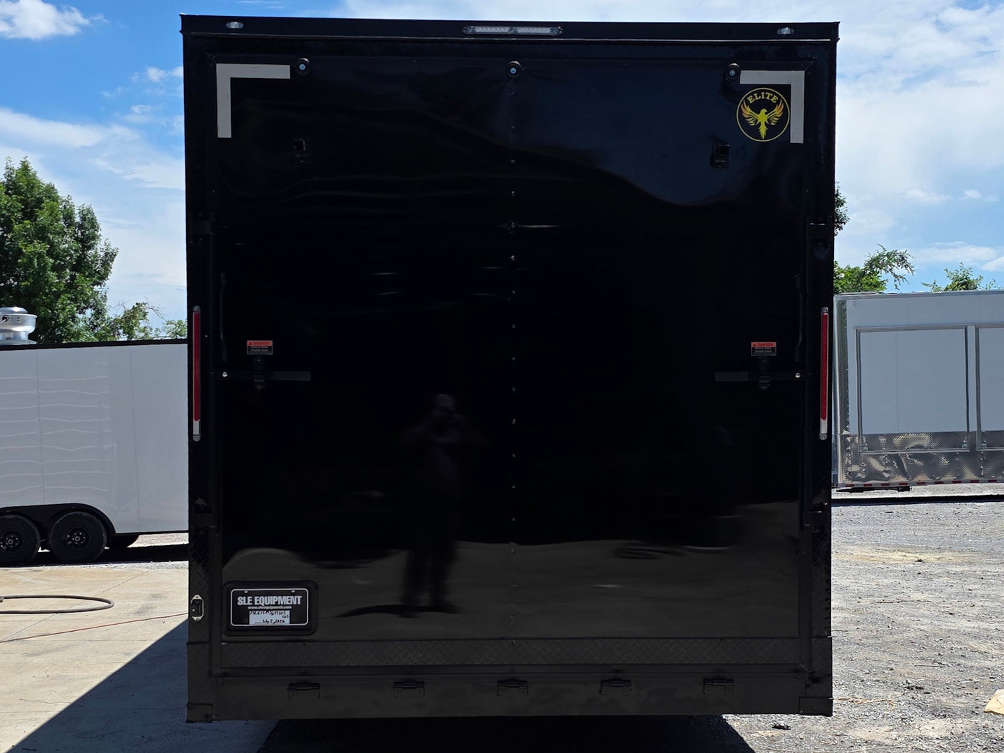 8.5' X 24' Custom Stage and Marketing Showcase Enclosed Trailer Back side picture 
