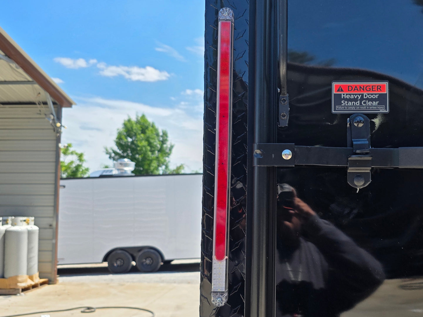 8.5' X 24' Custom Stage and Marketing Showcase Enclosed Trailer Interior back side picture Brake light picture 