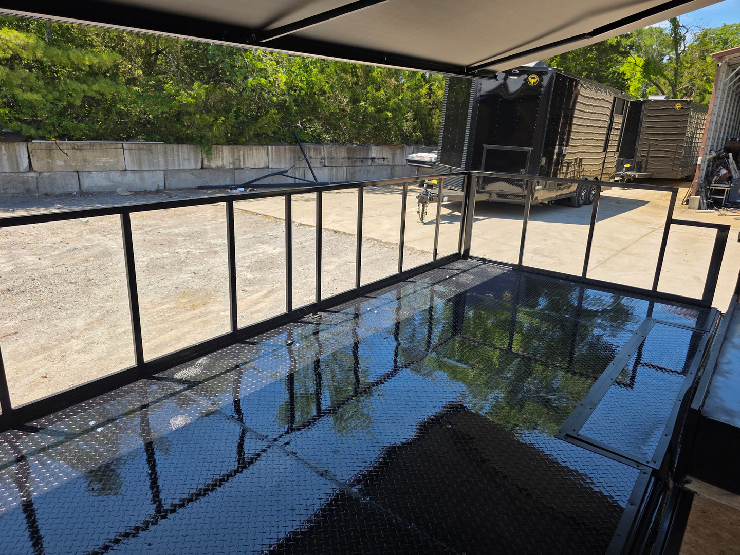 8.5' X 24' Custom Stage and Marketing Showcase Enclosed Trailer Interior back side picture  Interior front right angle picture 