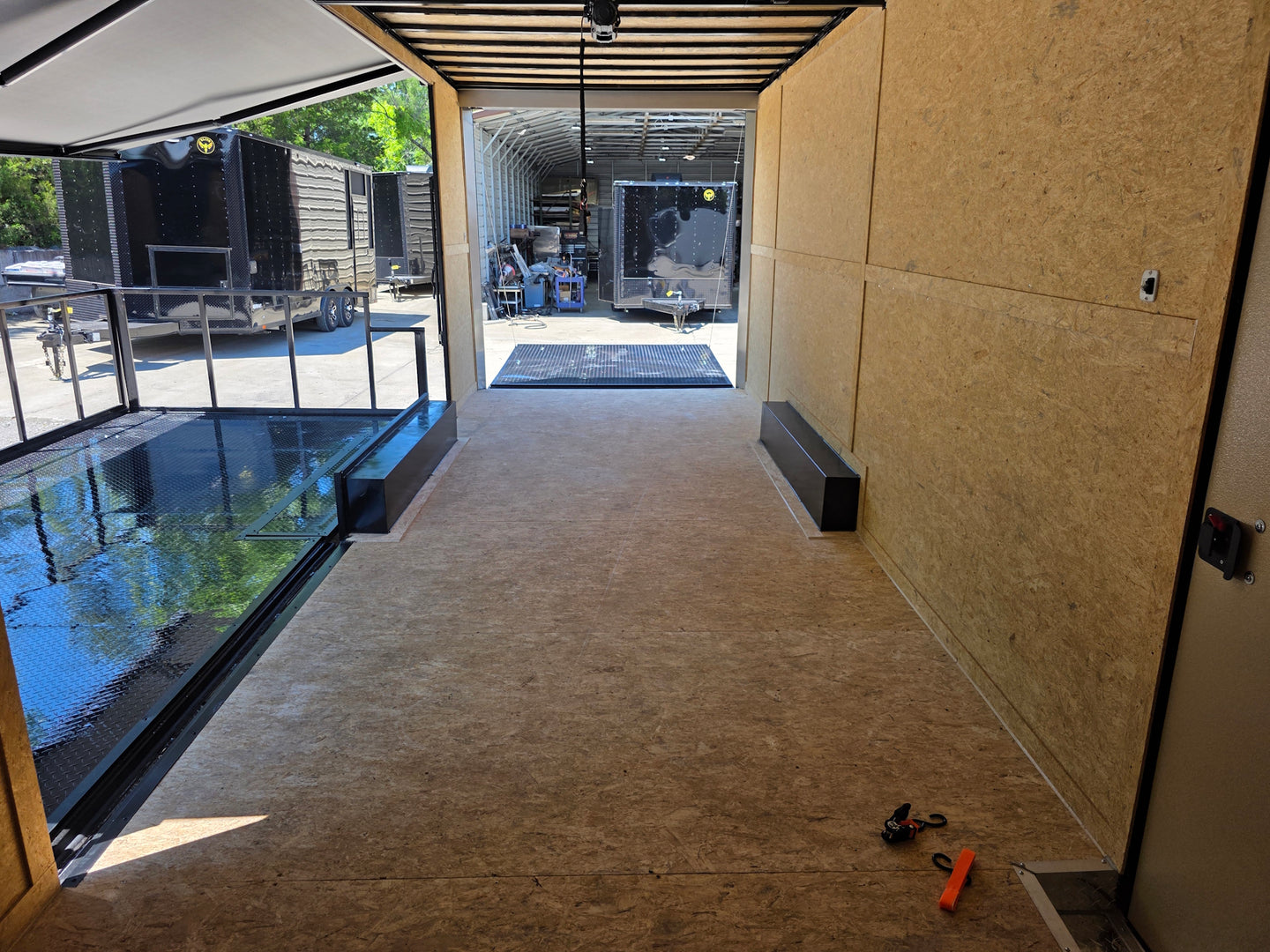 8.5' X 24' Custom Stage and Marketing Showcase Enclosed Trailer Interior back side picture  Interior front side picture 