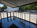 8.5' X 24' Custom Stage and Marketing Showcase Enclosed Trailer Interior back side picture  Interior stage back left angle view 
