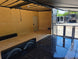 8.5' X 24' Custom Stage and Marketing Showcase Enclosed Trailer Interior back side picture  Interior stage back right angle picture 