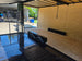 8.5' X 24' Custom Stage and Marketing Showcase Enclosed Trailer Interior back side picture  Interior stage front left angle picture 