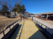 8.5' X 24' Hybrid Trailer Black With Black Out Package 7K Axles back deck straight view picture 