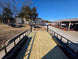 8.5' X 24' Hybrid Trailer Black With Black Out Package 7K Axles back deck straight view picture 
