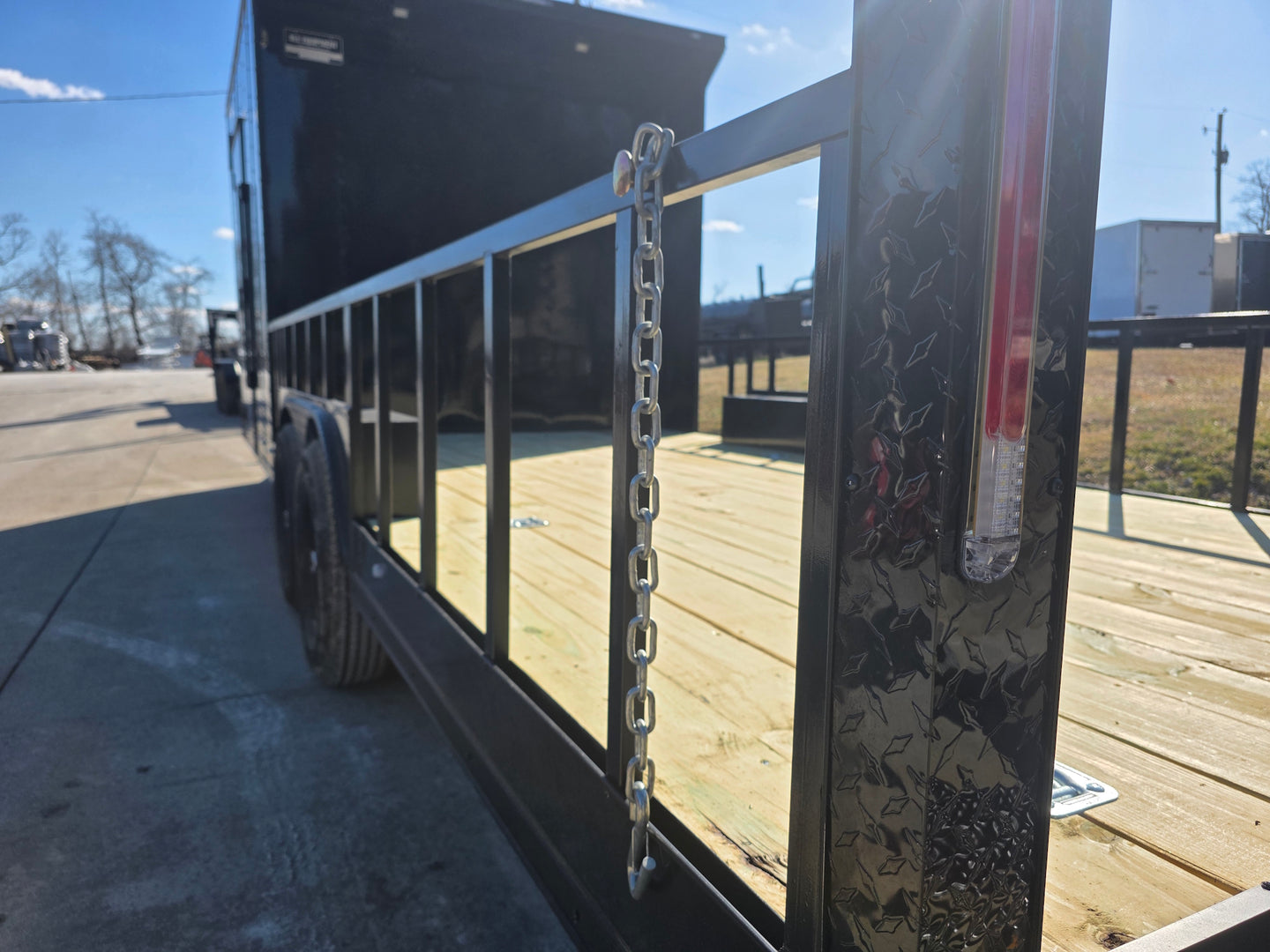 8.5' X 24' Hybrid Trailer Black With Black Out Package 7K Axles chain latch view picture 