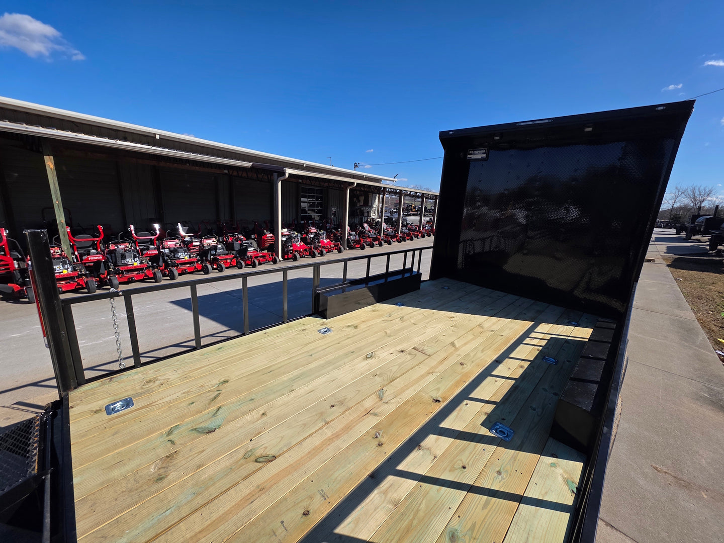 8.5' X 24' Hybrid Trailer Black With Black Out Package 7K Axles front deck right angled view picture 